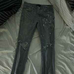grey and white purple brand jeans